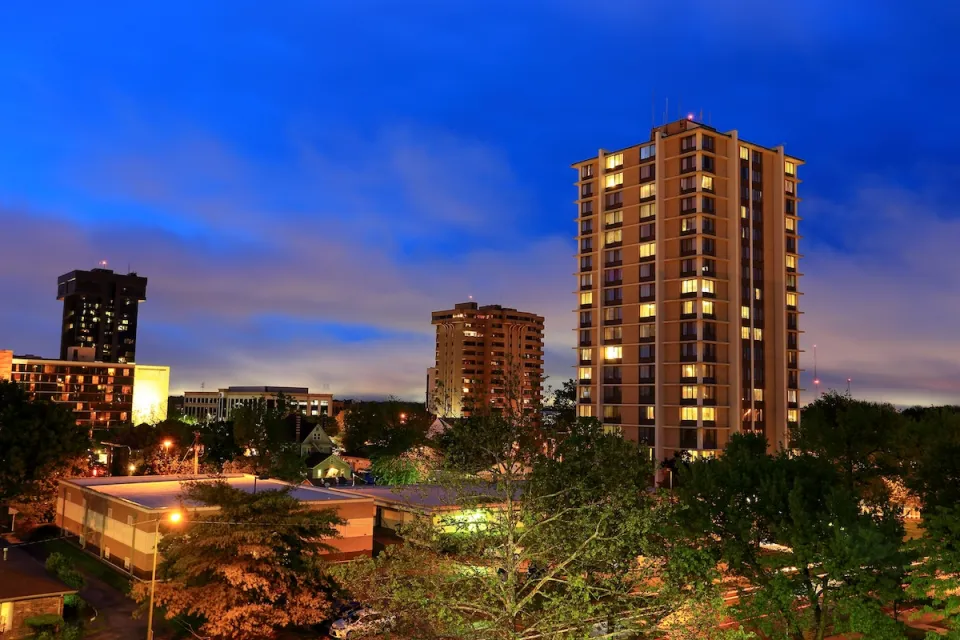 Buildings in downtown Springfield, Missouri at dusk.